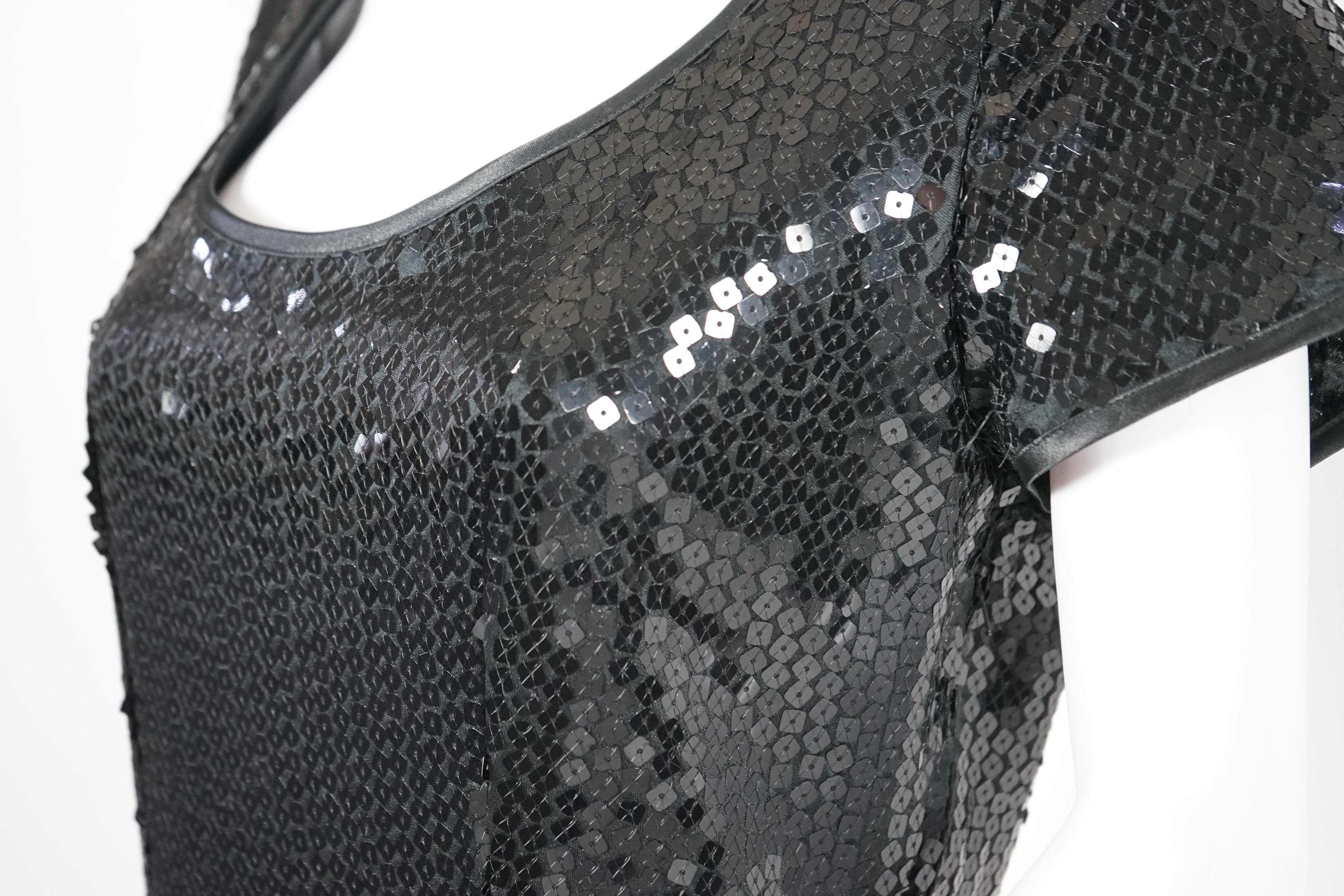 Two vintage Yves Saint Laurent variation lady's black evening dresses, F 42 (UK 14). Proceeds to Happy Paws Puppy Rescue